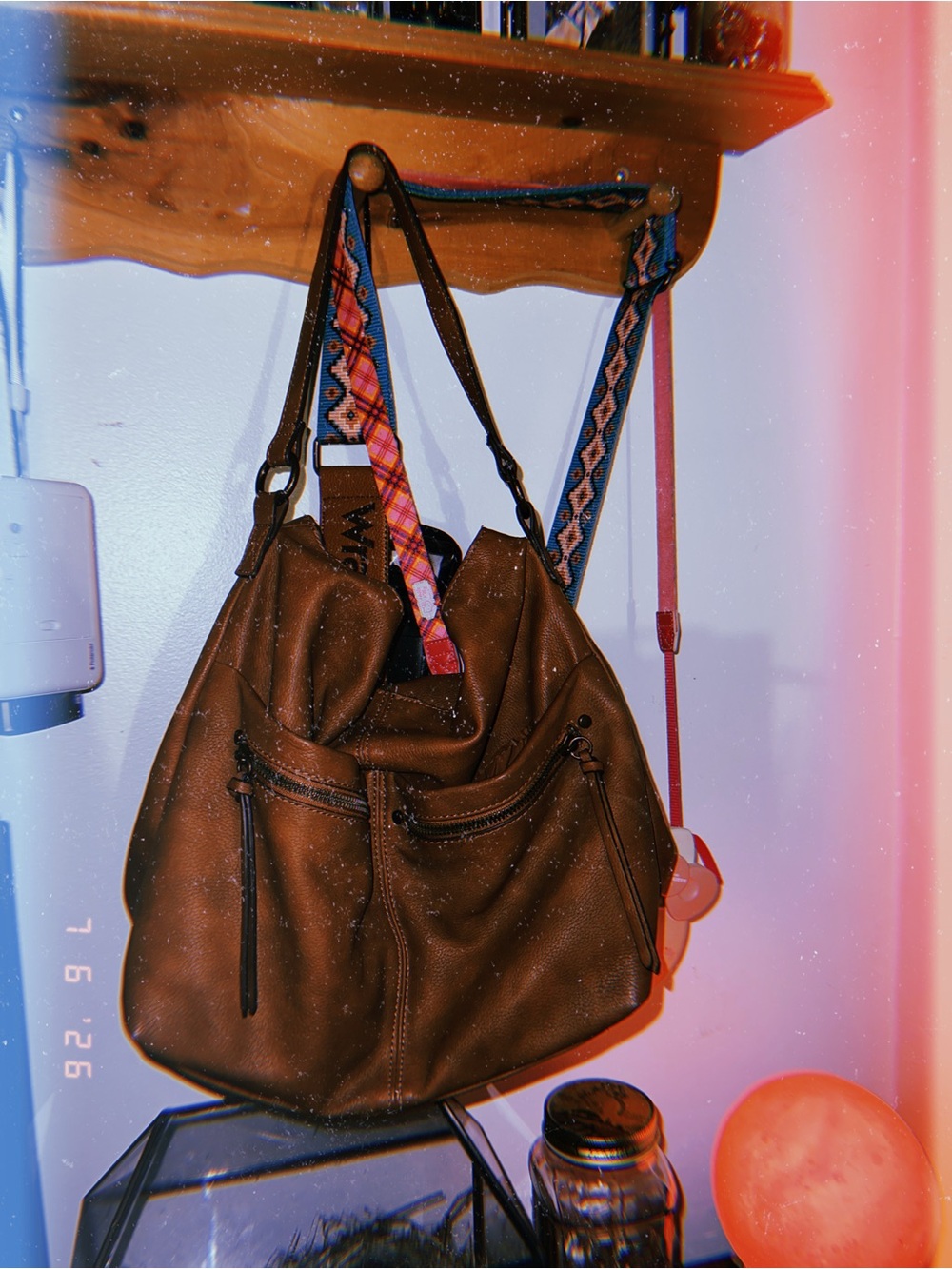 Stylish Brown Leather Shoulder Bag with Patterned Straps